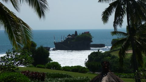 http://www.nvisible.com/nvisiblegraphics/ph/9/TanahLot-Temple-Palms.jpg