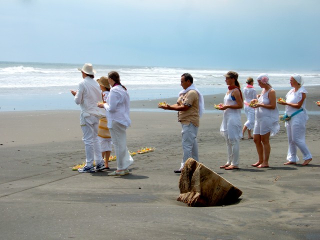 We place our offerings in a row on the sand.